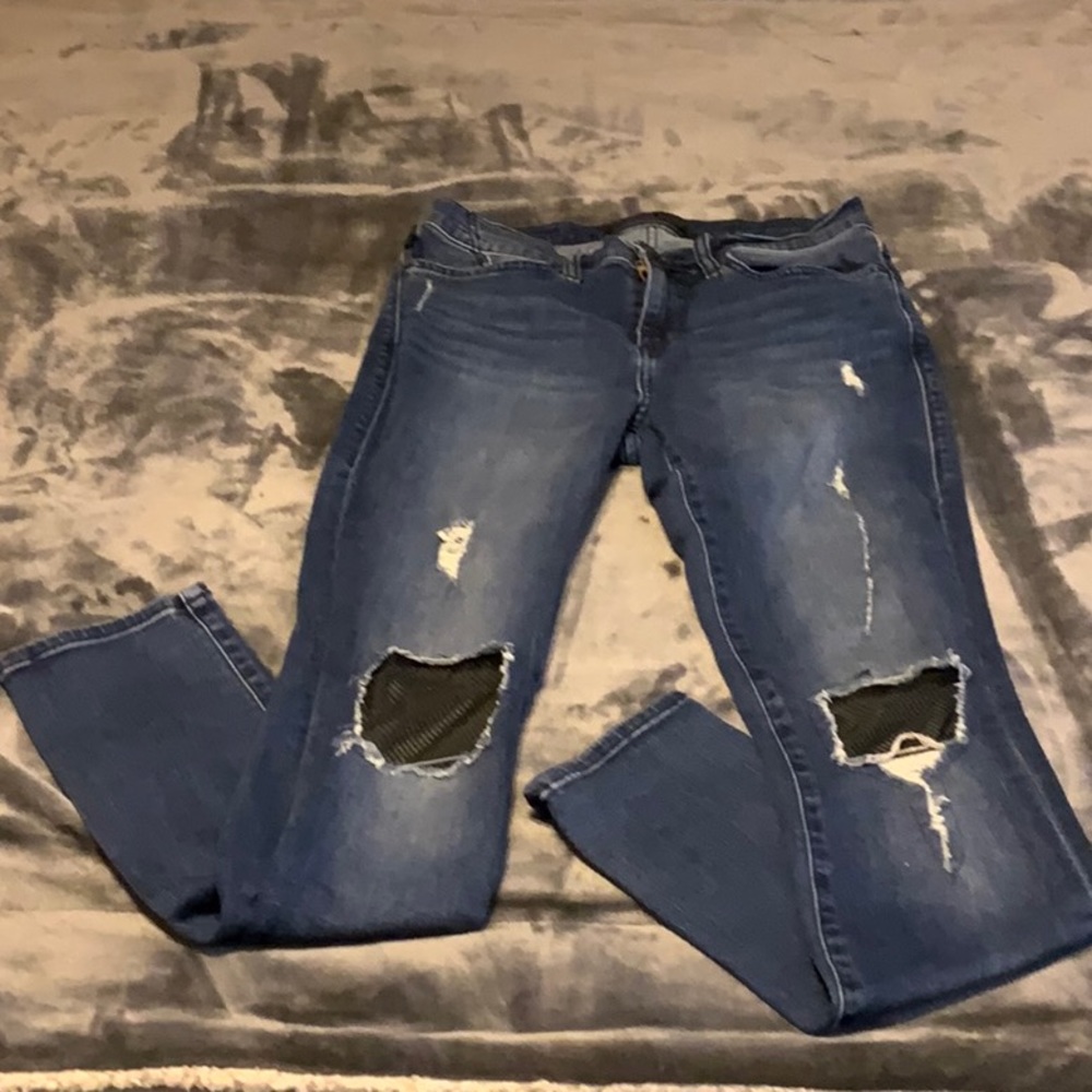 Rock & Republic distressed skinny jeans fishnet behind rips